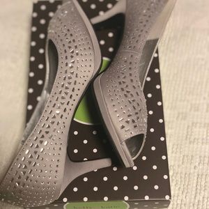 Silver open toed pumps